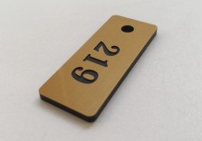 Брелок из пластика 50х17х3мм